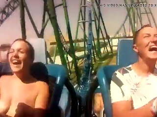 Hot teen can't keep her tits in on rollercoaster