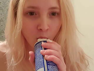 Cute girl gets crazy with whipped cream 