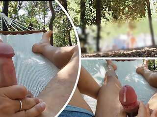 Naked in the park in the hammock he touches my cock until I cum with people passing around - MissCreamy