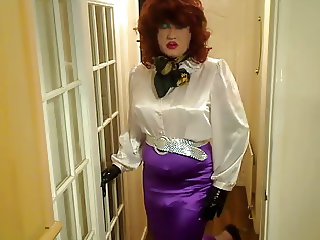Candi in satin blouse and skirt