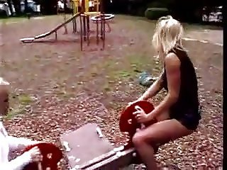 Amateur woman pissing on a swing jy