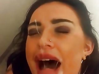 Facial and she rubs cum on her face