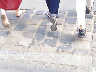 barefoot girl in the city, dirty soles