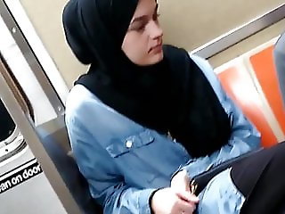 Cute Muslim girl on train