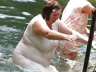 Mature Russian women bathe in cold water 