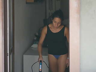 Brunette neighbor in underwear while doing chores