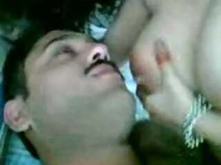 Desi man feeding his wife boobs