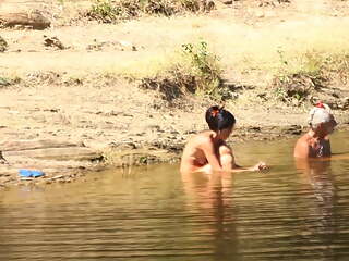 Couple have sex at small lake