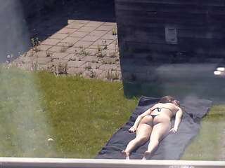 Sunbathing (Partly Topless)