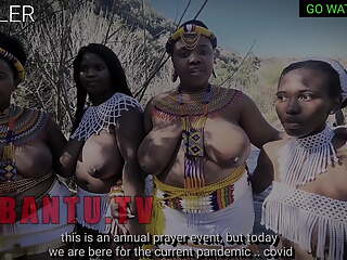 Busty topless South African girls do weird rituals