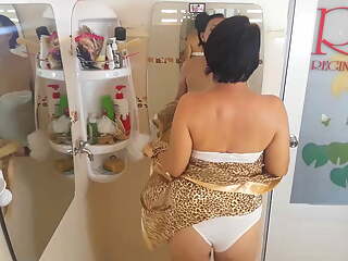 Hidden cam. Nice lady in the shower room trying on a leopard robe and white linen. Try on haul underwear cam 1-1
