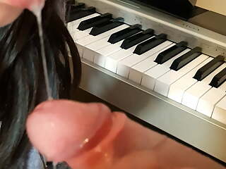 Blowjob on the piano - again interrupted by a hard cock.