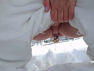 nippleringlover pissing outdoor in snow flashing huge pierced nipples and pierced pussy with stretched pussy lips