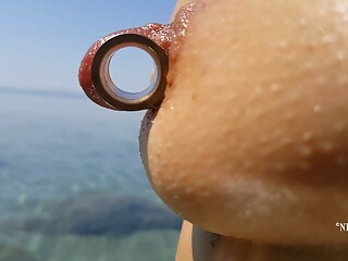 nippleringlover horny milf pissing nude beach pierced pussy wide open huge pierced nipples
