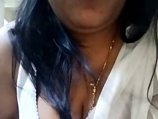Desi Indian aunty white saree blouse removing