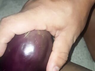Rosni is fingering & inserting Brinjal in her hot pussy.