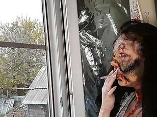 wife smokes cigarette makeup zombie