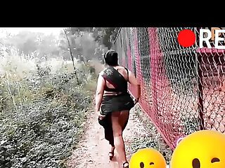 Tanya Indian model walking inside woods showing her massive ass.