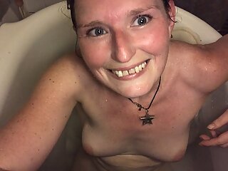 Hot step-mom masturbating with a vibrator in the bath and the orgasmic aftermath 