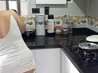 Mature is fucked by her stepson in the kitchen