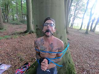 Tied up in the woods - She would help him