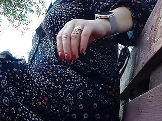 naughty milf relaxing in the park