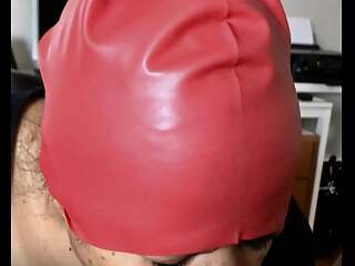 Blowjob with elegant red latex cap