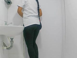 Amateur camera in public bathroom captures nurse pissing(public)