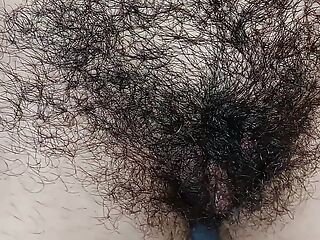 Hot mom fingers her hairy pussy, big breasts, big nipples. Sexy Latina satisfies herself, hairy ass, big breasts, long hair.