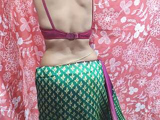 Sexy housewife saree wearing and boobs press by the servant