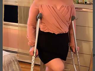 Sexy blonde amputee Bionic Beauty heels and crutches