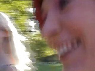 Pretty amateur German teens teasing each other's cunts in the park