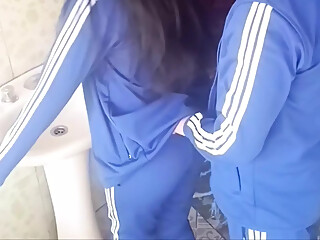 A student was caught in the bathroom. She couldn't stand the pressure on her pussy and came quickly.