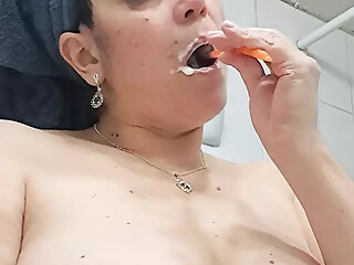 Mom brushing her teeth well is it toothpaste or milk sucked