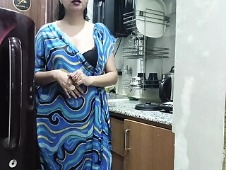 Indian stepmom watches and enters her stepson's Kitchen to fuck him.