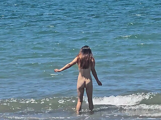 Korean teen at the beach showing hot body perfect tits