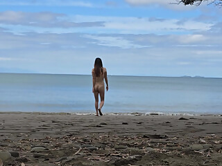 Korean teen walking naked on the beach with perfect tits