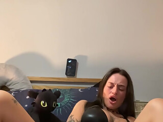 Tattooed emo slut moan as she rides on her dildo on cam