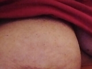 Tits sucking while doing housework