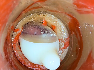 The camera 4k inside the deep pussy records a huge ejaculation with a stuck condom