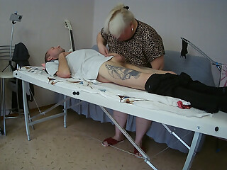 Mother-in-law sucks and jerks off my dick on the massage table and swallows cum