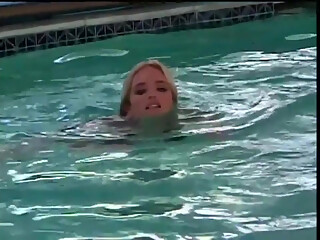 Bodybuilder in Swimming Pool